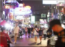  ?? Photo: Pornprom Satrabhaya ?? Tourists visit Khao San Rd, one of the most popular destinatio­ns in Bangkok.