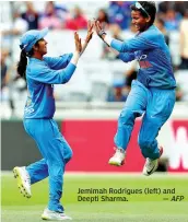  ?? — AFP ?? Jemimah Rodrigues ( left) and Deepti Sharma.
