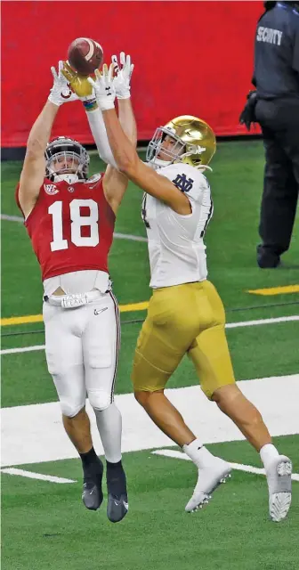  ?? ROGER STEINMAN/AP ?? Notre Dame safety Kyle Hamilton, attempting to break up a pass to Alabama wide receiver Slade Bolden during the Rose Bowl last season, is a potential top-five pick in next spring’s NFL Draft.