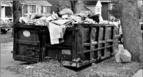  ??  ?? For months, this disposal bin was illegally left on the roadway on 32nd St. in Etobicoke, in front of a house that was being renovated.