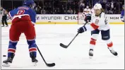  ?? BRUCE BENNETT — GETTY IMAGES ?? The Panthers' Ryan Lomberg, right, scores the go-ahead goal against the Rangers in the third period at New York.