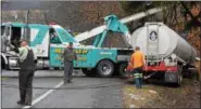  ?? MARIAN DENNIS – DIGITAL FIRST MEDIA ?? Route 73 in Colebrookd­ale Township remained closed for several hours as crews worked to remove a tractor trailer from an embankment.