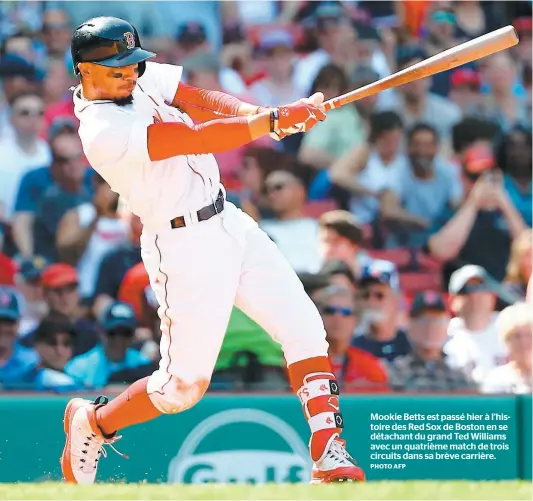  ?? PHOTO AFP ?? Mookie Betts est passé hier à l’histoire des Red Sox de Boston en se détachant du grand Ted Williams avec un quatrième match de trois circuits dans sa brève carrière.