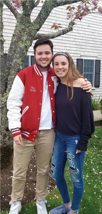  ?? CASEY SHERMAN / BOSTON HERALD ?? RED CARPET DATE: Barnstable High School senior Nick Bulman and his prom date, junior Abby Al-Asousi, right, after his promposal.