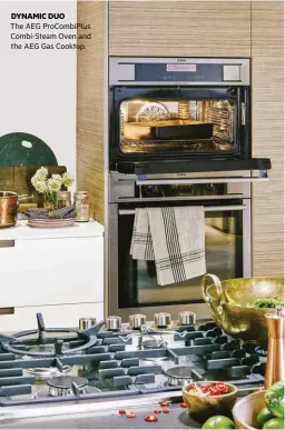  ??  ?? DYNAMIC DUO
The AEG ProCombiPl­us Combi-Steam Oven and the AEG Gas Cooktop.