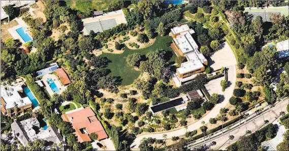  ?? Photograph­s by NearMap ?? DAVID GEFFEN paid $68 million for Olympic organizer Casey Wasserman’s Beverly Hills home above Sunset Boulevard.