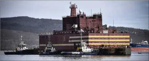  ??  ?? Floating power unit Akademik Lomonossov is being towed to Atomflot moorage of the Russian northern port city of Murmansk. — AFP photo