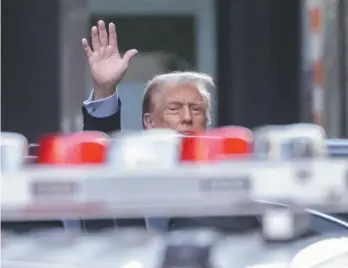  ?? YUKI IWAMURA ASSOCIATED PRESS ?? Donald Trump devant la Trump Tower vendredi, à New York