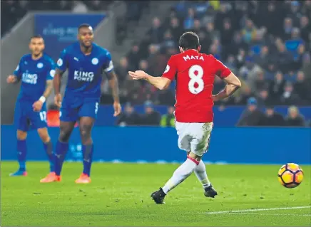  ??  ?? FINISHING TOUCH: Juan Mata scores the third goal of Manchester United’s victory over Leicester.