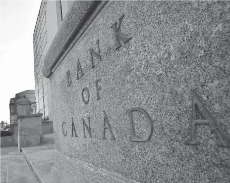  ?? GEOFF ROBINS/AFP/GETTY IMAGES FILES ?? The Bank of Canada has noted Wednesday that recent developmen­ts have reinforced its view that higher rates will be warranted to keep inflation near its target. It added that it will take a gradual approach and be guided by the economic data.