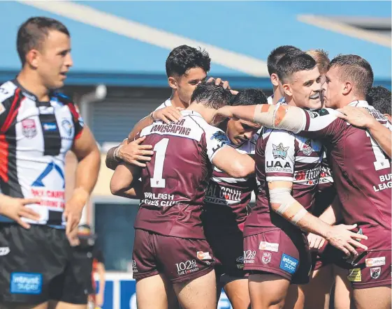  ?? Picture: SMP IMAGES ?? Burleigh Bears players celebrate a try during yesterday’s win over Intrust Super Cup derby rivals Tweed.