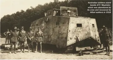  ??  ?? Australian soldiers stand beside A7V ‘Mephisto’, which was abandoned by its crew and recovered by Allied soldiers in 1918