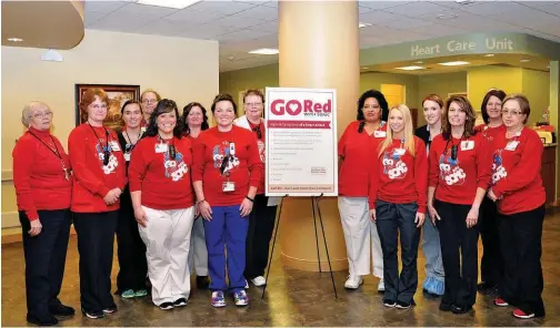  ??  ?? To raise the visibility of healthy heart awareness, Southern Ohio Medical Center employees sport red as part of National Wear Red Day. SOMC and its employees “Go Red” every February.