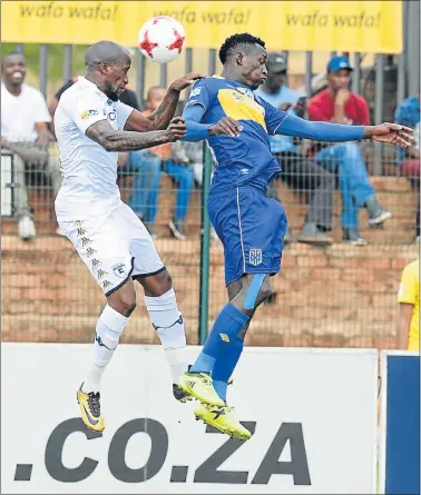  ?? Picture: GALLO IMAGES/LEE WARREN ?? GOING HEAD TO HEAD: Sfiso Hlanti, of Wits, and Sibisiso Masina, of Cape Town City, during their MTN8 semifinal at the Bidvest Stadium in Johannesbu­rg yesterday