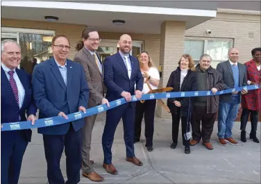  ?? ROGER SEIBERT — MEDIANEWS GROUP ?? Officials cut the ribbon at Colonial II Apartments in Rome.