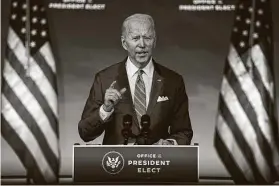  ?? Amr Alfiky / New York Times ?? President-elect Joe Biden reveals his $1.9 trillion rescue package Thursday, including a minimum wage of $15 per hour and child care boosts.