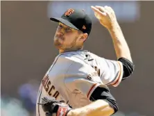  ?? Carlos Osorio / Associated Press ?? Chris Stratton endured some rocky early innings but was able to pitch into the seventh to save the Giants’ bullpen.