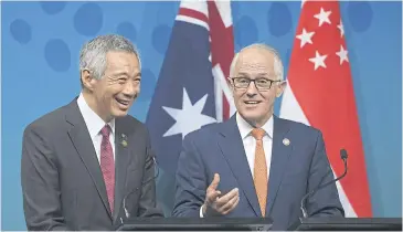  ?? EPA ?? Singapore Prime Minister Lee Hsien Loong and Australian Prime Minister Malcolm Turnbull attend a press conference prior to the start of the Asean-Australia Special Summit in Sydney yesterday.