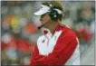  ?? JIM RASSOL — SOUTH FLORIDA SUN-SENTINEL VIA AP ?? Florida Atlantic’s new head football coach Lane Kiffin takes the field for his first college football spring game at the school in Boca Raton, Fla., Saturday.