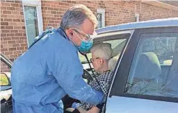  ?? PROVIDED ?? Dr. Keith Sadel cares for a patient from his Upper Southampto­n, Pa., family practice, which has been trying to get the vaccine for its patients.