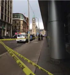  ?? TONDA MACCHARLES ?? The scene outside an RCMP detachment office near Parliament Hill on Thursday after a Mountie was reportedly found with self-inflicted injuries.