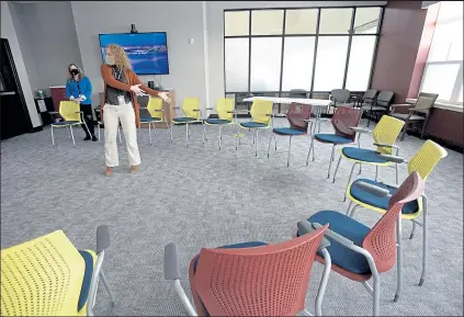  ?? JENNY SPARKS / Loveland Reporter-herald ?? Meredith Vasa, center left, a primary therapist at Northpoint Recovery Colorado, talks Tuesday about the importance of group therapy in the recovery process at the new facility in Loveland.