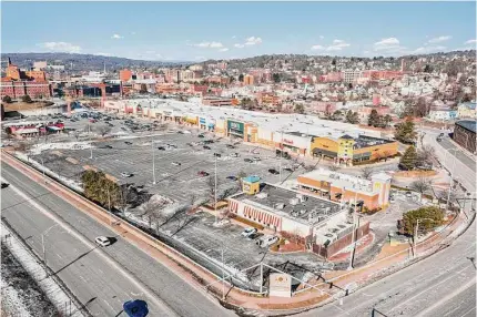  ?? Contribute­d photo ?? An aerial view of the Brass Mill Commons shopping center in Waterbury. The retail center, which was just purchased in April by a Great Neck, N.Y., company, is once again up for sale.