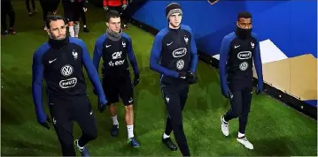  ?? (Photo AFP) ?? Lemar, ici avec Rami, Corchia et Rabiot, a découvert la pelouse du stade de France avec les Bleus.