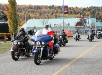  ?? CITIZEN PHOTO BY JAMES DOYLE ?? Hundreds of motorcycli­sts took part in the 37th annual Prince George Toy Run on Sunday afternoon.