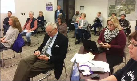  ?? EVAN BRANDT — MEDIANEWS GROUP ?? In attempt to mitigate potential contaminat­ion from the coronaviru­s, seats in the audience at Sunday afternoon’s Phoenixvil­le School Board meeting we separated by six feet.