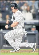  ??  ?? The Yankees’ Luke Voit celebrates after scoring on a sacrifice fly by Didi Gregorius in the sixth inning Wednesday night.