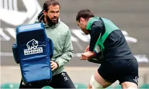  ??  ?? Taking charge: Ireland head coach Andy Farrell works with captain James Ryan in Twickenham (above). Second-row Ryan will be the 107th player to captain Ireland. Big stage: Leinster’s Ross Byrne (below), who has been selected at fly-half for the Autumn Nations Cup Group A clash with England. He comes in for the injured Johnny Sexton.