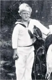  ??  ?? Naval destiny: Prince Philip in a sailor suit in 1926