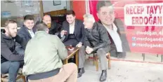  ?? — AFP ?? Recep Tayyip Erdogan (2nd R), candidate in March 31 elections for a village chief post in a neighbourh­ood of Golcuk in Turkey’s northwest, shares tea on February 13 in Golcuk outside his campaign headquarte­rs.