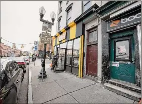  ?? ?? The Pearl Fried Chicken restaurant on South Pearl Street in Albany changed the way it does business to reduce outside confrontat­ions.