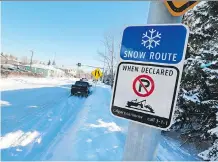  ?? GAVIN YOUNG ?? A snow route parking ban comes into force 10 a.m. on Saturday.