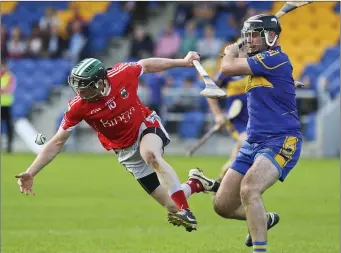  ??  ?? Glenealy’s Daniel Staunton flies past the challenge of Carnew’s Graham Keogh during the SHC semi-final in Aughrim. Picture: Garry O’Neill