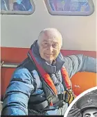  ?? ?? Tony on a fishing trawler as he explores the work done on the Thames at night