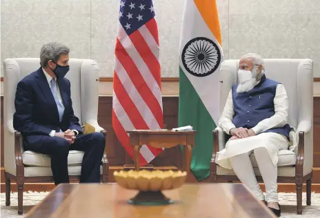  ?? Reuters ?? US climate envoy John Kerry with Indian Prime Minister Narendra Modi. India is under pressure to cut carbon emissions