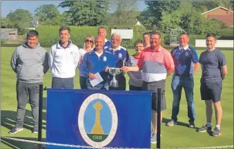  ??  ?? Finalists, semi-finalists and sponsors of the Archie Johnston memorial pairs. Winners John Mclean and Robert Coffield can be seen at the front holding the trophy.