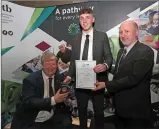  ??  ?? County mayor Cllr Patrick Gerard Murphy, chairman of Cork ETB, presents Matthew McGlynn with the ‘Board Medal’; included is the principal of Davis College, Stephen Gilbert.