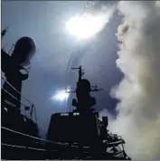  ?? Russian Defense Ministry ?? AN IMAGE from video shows a Russian warship launching a cruise missile against militants in Syria.