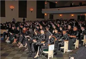  ?? SUBMITTED PHOTOS ?? Achievemen­t House Cyber Charter School students celebrate their graduation during a ceremony held at West Chester University.