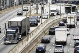  ?? MATT ROURKE / AP ?? The EPA on Friday, set new greenhouse gas emissions standards for heavy-duty trucks, buses and other large vehicles, an action that officials said will clean up some of the nation’s largest sources of planet-warming pollution.