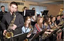  ??  ?? The Troy High School Jazz Ensemble performs during the fifth annual A Taste of Troy, hosted by the Hope 7Community Center on April 14, 2015, at the Franklin Terrace Ballroom in Troy.