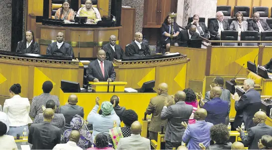  ?? Picture: GCIS ?? LOVING IT. President Cyril Ramaphosa gets a standing ovation while responding to the debate on the State of the Nation address in parliament yesterday. Ramaphosa’s Sona focused on economic developmen­t, job creation and enhancing the capacity of the state.