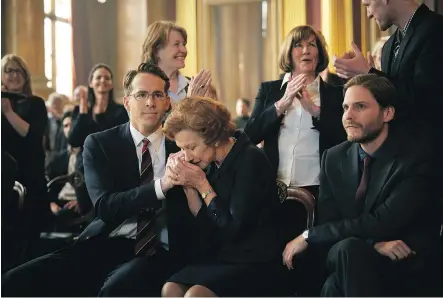  ?? ROBERT VIGLASKY/ THE WEINSTEIN COMPANY ?? Ryan Reynolds, left, Helen Mirren and Daniel Bruh star in Woman in Gold, a film that, despite decent performanc­es by the cast, never rises to the demands of its rich and complex subject matter — the restitutio­n of art stolen from Jews by the Nazis.