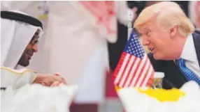  ??  ?? Abu Dhabi Crown Prince Mohammed bin Zayed al-Nahayan, left, chats with President Donald Trump on Sunday in Riyadh, Saudi Arabia. Bandar al-Jaloud, AFP