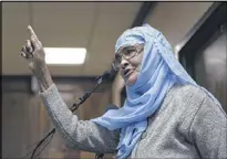  ??  ?? Amina Osman, with the Internatio­nal Community Outreach & Informatio­n Services, speaks at a special session of the Clarkston City Council.