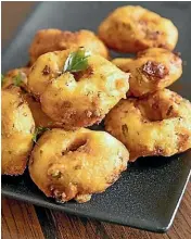  ?? FACEBOOK ?? St Anthony’s Food’s vada are crispy, savoury fried doughnuts created with a house-made lentil batter. ,